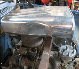 Illustration for article titled Hood Scoop Adds Dignity, Top Fuel Power To LeMons Volvo
